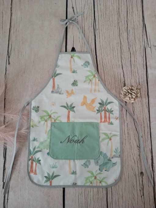 Tablier enfant dino vert / tissu uni vert clair