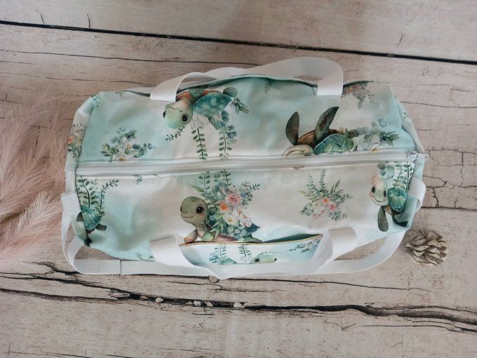 Sac à langer tortue / tissu uni vert clair