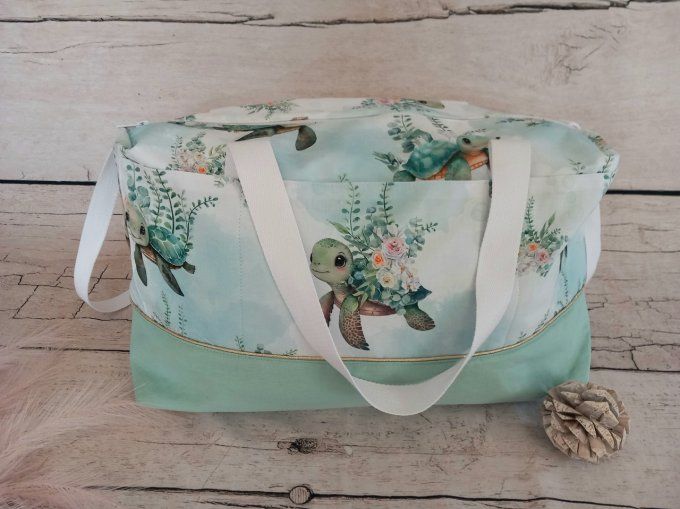 Sac à langer tortue / tissu uni vert clair