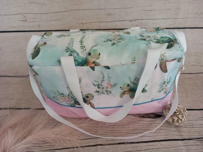 Sac à langer tortue / tissu uni rose clair