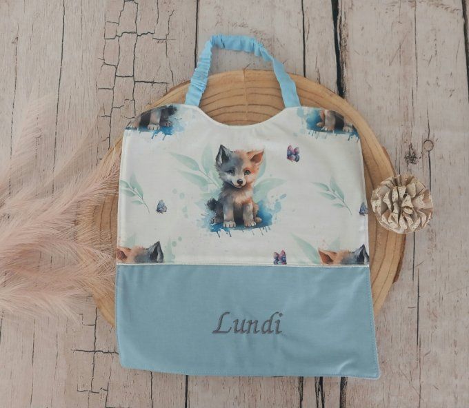 Grand bavoir élastique loup / uni bleu clair