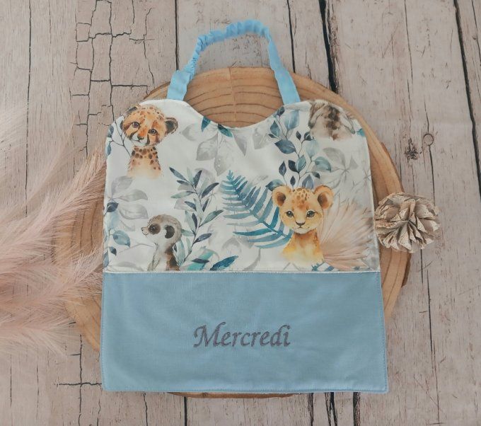 Grand bavoir élastique prénom animaux bleus / uni bleu clair