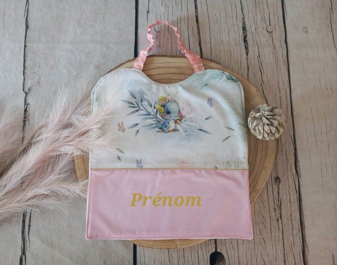 Grand bavoir élastique prénom dragons / uni rose clair