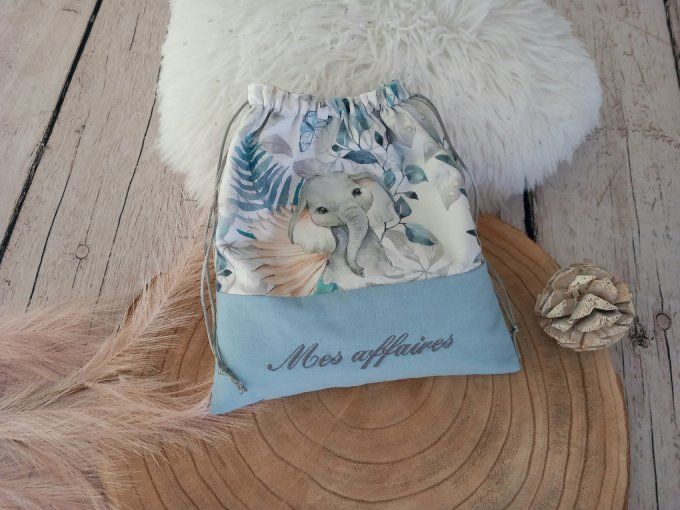 Pochon animaux bleus / uni bleu clair