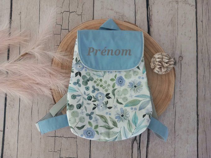 Sac à dos enfant fleurs bleues / rabat uni bleu clair