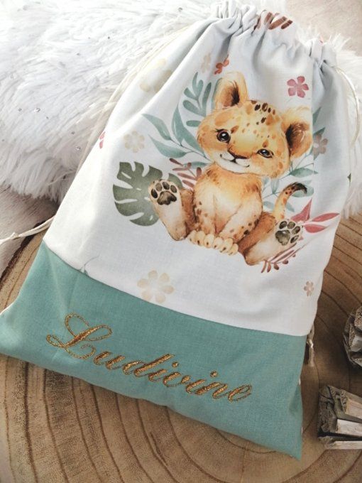 Pochon lion fleur /  uni vert clair